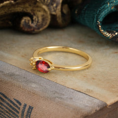 0.5ct Oval Garnet Ring with Side Stone Modern Promise Look