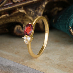 0.5ct Oval Garnet Ring with Side Stone Modern Promise Look