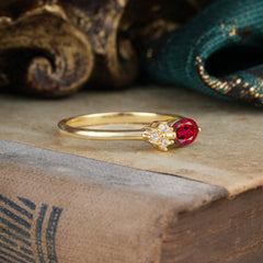 0.5ct Oval Cut Ruby Ring with Side Stones for Her