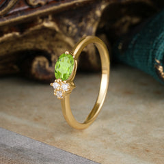 0.5ct Oval Cut Peridot Ring with Side Stones for Her
