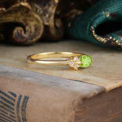 0.5ct Oval Cut Peridot Ring with Side Stones for Her