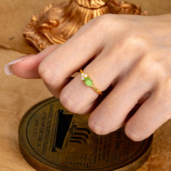 0.5ct Oval Cut Peridot Ring with Side Stones for Her