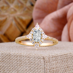 Vintage 4 Prong Oval Cut  Lab Diamond Engagement Ring Cluster Pave Bridal Ring showcased on a display.
