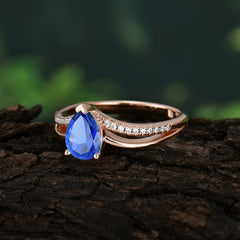 Contemporary 3-Prong Pear Cut Sapphire Ring