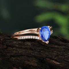 Contemporary 3-Prong Pear Cut Sapphire Ring