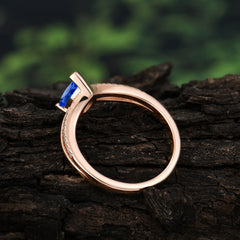 Contemporary 3-Prong Pear Cut Sapphire Ring