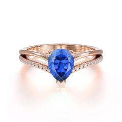 Contemporary 3-Prong Pear Cut Sapphire Ring