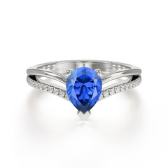 Contemporary 3-Prong Pear Cut Sapphire Ring