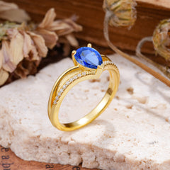 Contemporary 3-Prong Pear Cut Sapphire Ring