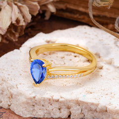Contemporary 3-Prong Pear Cut Sapphire Ring