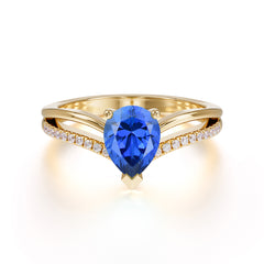 Contemporary 3-Prong Pear Cut Sapphire Ring