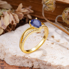 1.25 Carat Pear Cut Tanzanite Ring Split Shank Engagement Ring