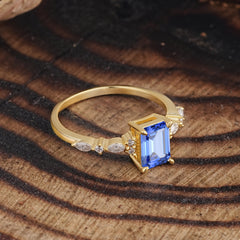 4 Prong Timeless Emerald Cut Sapphire Engagement Ring
