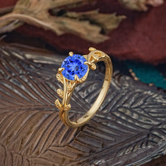 4 Prong Round Cut Sapphire Nature Inspired Leaf Engagement Ring