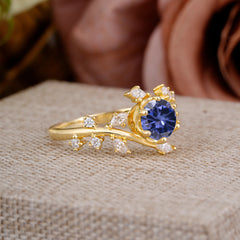Nature-Inspired 6 Prong Round Cut Tanzanite Ring