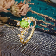 Nature-Inspired Branch 6 prong Oval-Cut Peridot Engagement Ring