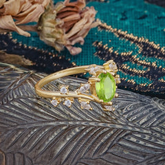 Nature-Inspired Branch 6 prong Oval-Cut Peridot Engagement Ring