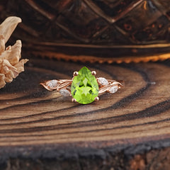 Nature-Inspired Pear-Shaped Classic Peridot Ring for Engagement and Weddings