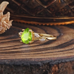 Nature-Inspired Pear-Shaped Classic Peridot Ring for Engagement and Weddings