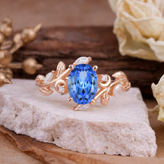 4 Prong Nature Inspired Leafy Vine Pear Cut Sapphire Engagement Ring