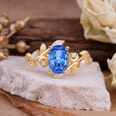 4 Prong Nature Inspired Leafy Vine Pear Cut Sapphire Engagement Ring