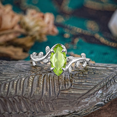 Nature-Inspired Leafy Branch 4-Prong Marquise Peridot Engagement Ring