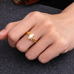 Nature-Inspired Leafy Branch 4-Prong Marquise Moissanite Engagement Ring