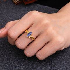 Nature-Inspired Leafy Branch 4-Prong Marquise Tanzanite Engagement Ring