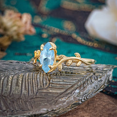 Nature-Inspired Leafy Branch 4-Prong Marquise Aquamarine Engagement Ring