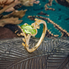 Nature-Inspired Leafy Branch 4-Prong Marquise Peridot Engagement Ring