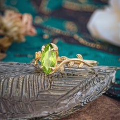 Nature-Inspired Leafy Branch 4-Prong Marquise Peridot Engagement Ring