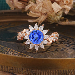 Nature-Inspired Sunflower 4-Prong Round Cut Sapphire Engagement Ring