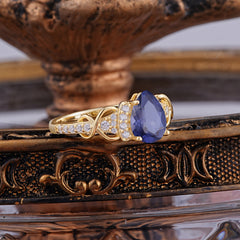 Luxury 4-Prong Pear-Shaped Tanzanite Wedding Ring