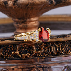Luxury 4-Prong Pear-Shaped Garnet Wedding Ring