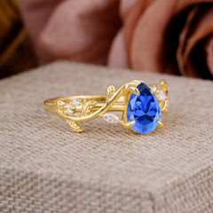 4 Prong Nature Inspired Pear Cut Sapphire Leaf Gold Engagement Ring