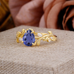 4 Prong Nature Inspired Pear Cut Tanzanite Leaf Gold Engagement Ring