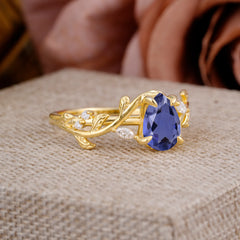 4 Prong Nature Inspired Pear Cut Tanzanite Leaf Gold Engagement Ring