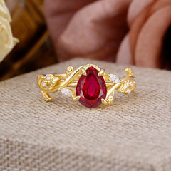 4 Prong Nature Inspired Pear Cut Ruby Leaf Gold Engagement Ring