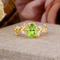 4 Prong Nature Inspired Pear Cut Peridot Leaf Gold Engagement Ring