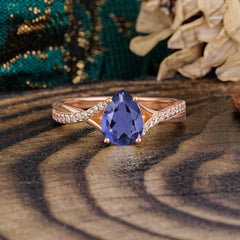 Timeless Vintage 4-Prong Pear-Cut Tanzanite Engagement Ring