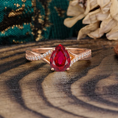 Timeless Vintage 4-Prong Pear-Cut Ruby Engagement Ring