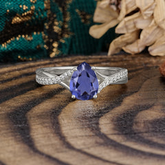 Timeless Vintage 4-Prong Pear-Cut Tanzanite Engagement Ring