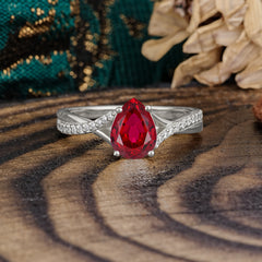 Timeless Vintage 4-Prong Pear-Cut Ruby Engagement Ring
