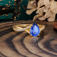 Timeless Vintage 4-Prong Pear-Cut Sapphire Engagement Ring