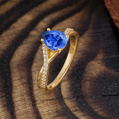Timeless Vintage 4-Prong Pear-Cut Sapphire Engagement Ring