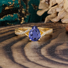 Timeless Vintage 4-Prong Pear-Cut Tanzanite Engagement Ring