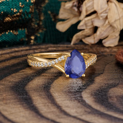 Timeless Vintage 4-Prong Pear-Cut Tanzanite Engagement Ring