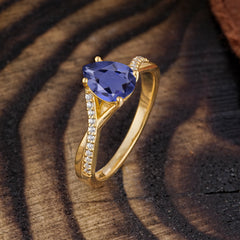 Timeless Vintage 4-Prong Pear-Cut Tanzanite Engagement Ring