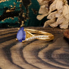 Timeless Vintage 4-Prong Pear-Cut Tanzanite Engagement Ring