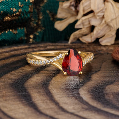 Timeless Vintage 4-Prong Pear-Cut Garnet Engagement Ring